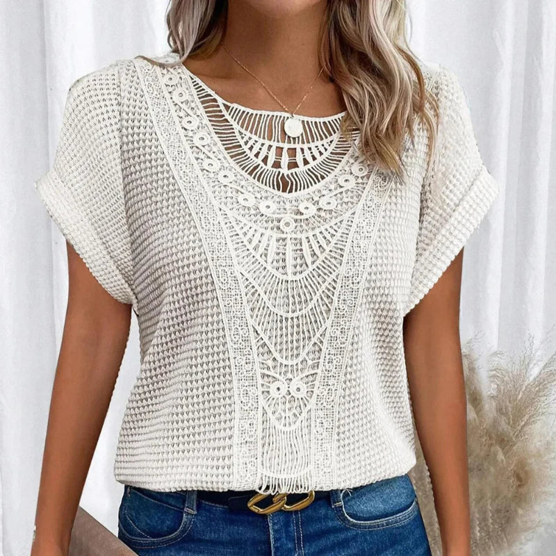 Stylish women's summer top, boho inspired with delicate crochet detail, offering a relaxed and chic fit.