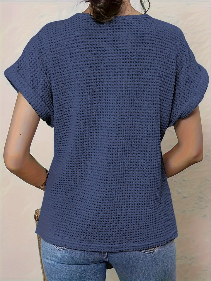 Boho casual short sleeve women's top, relaxed fit with exquisite crochet detail, great for summer fashion.