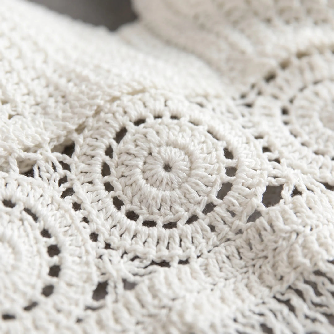 Boho women's crochet halter crop top with open back, ideal summer festival and beachwear.