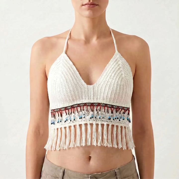 Fringed crochet halter crop top for women, a chic sleeveless bohemian design perfect for resort wear.