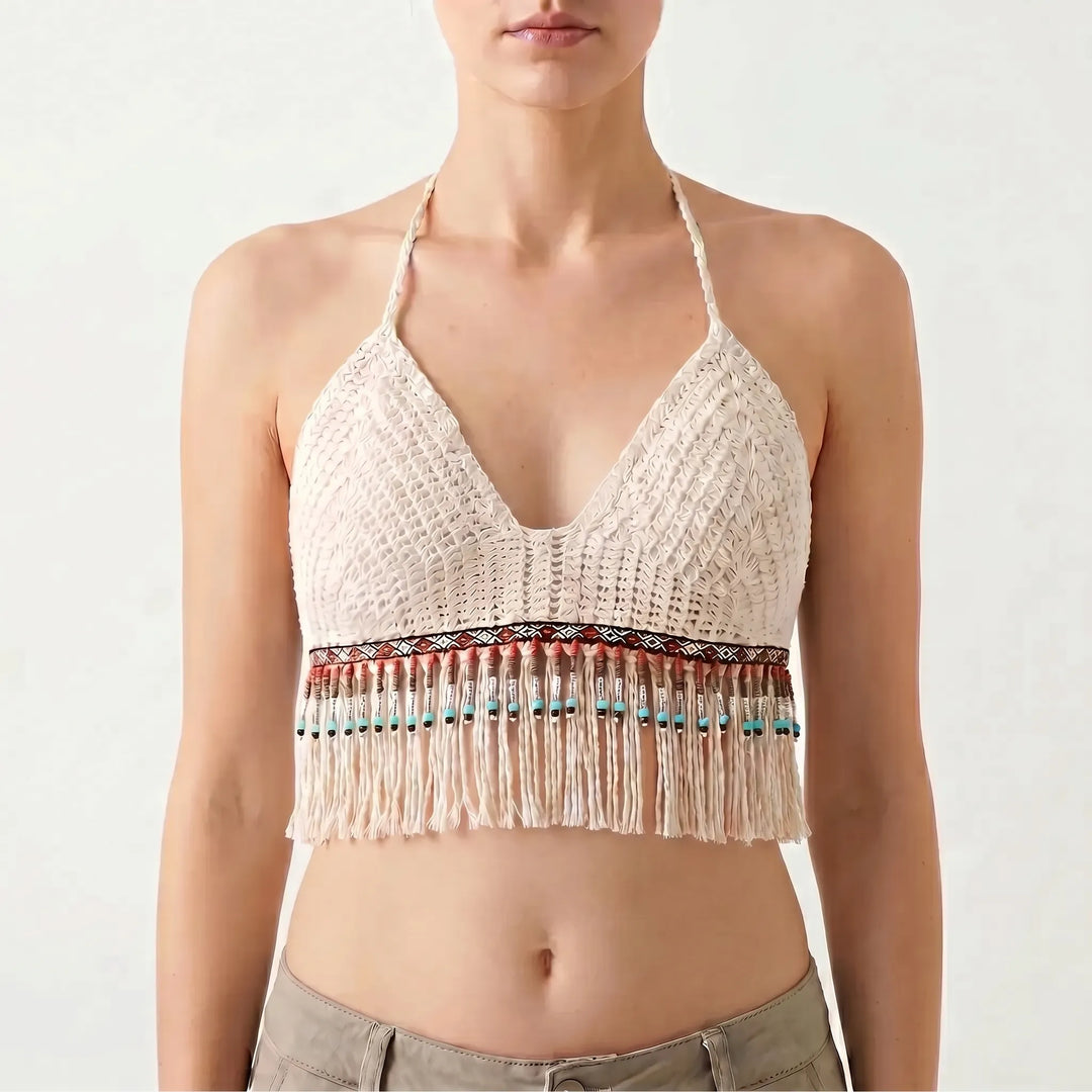 Women's sleeveless crochet halter crop top with open back, a bohemian chic choice for summer beach days.