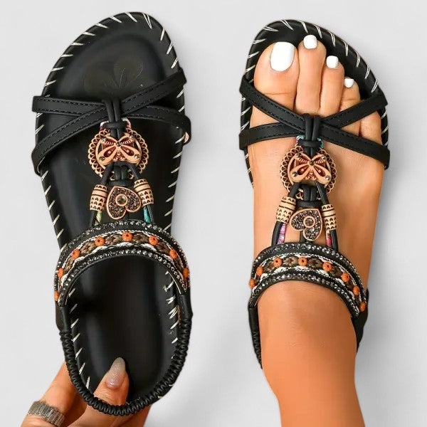 Bohemian style women's flat sandals, intricately embroidered. Ideal for beach and vacation wear.