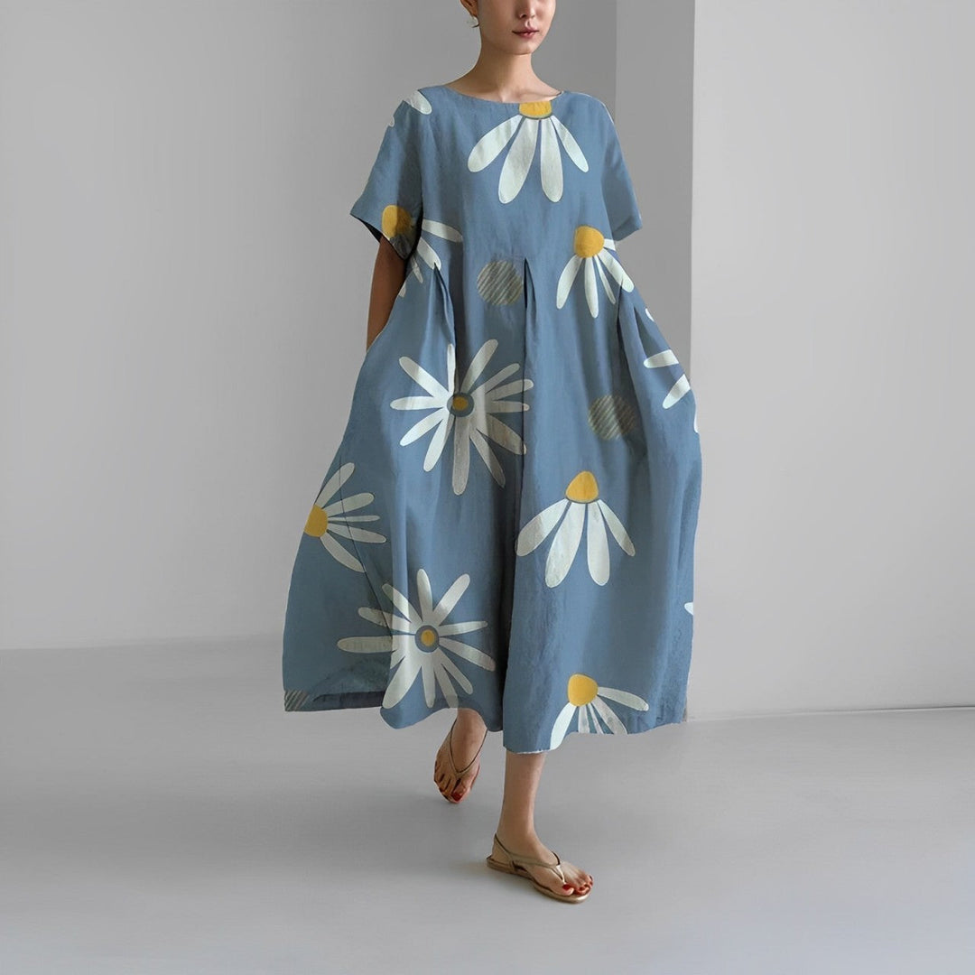 Vibrant floral boho maxi dress for women. Elegant and flowy, perfect summer dress for any fashion lover.