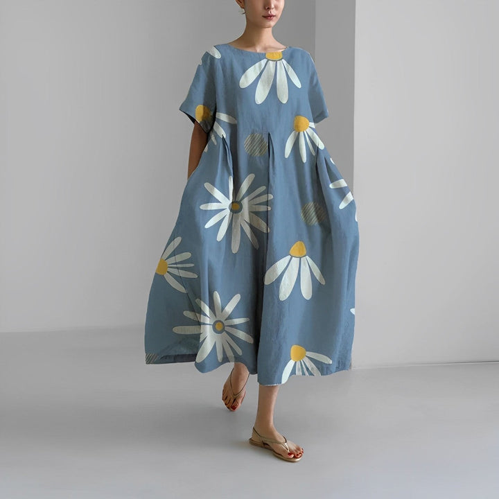 Vibrant floral boho maxi dress for women. Elegant and flowy, perfect summer dress for any fashion lover.