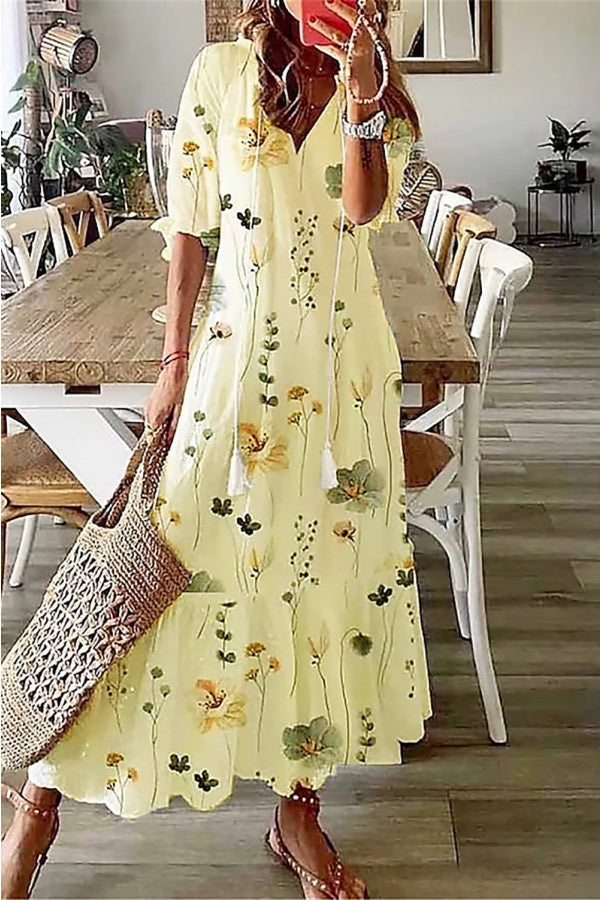 Relaxed fit women's boho floral maxi dress with tassel V-neck, great for summer fashion, beach or vacation.