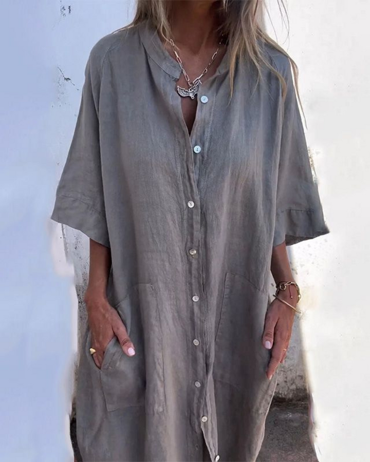 Women's boho floral print maxi dress with button-down front, perfect for summer casual wear or vacation.