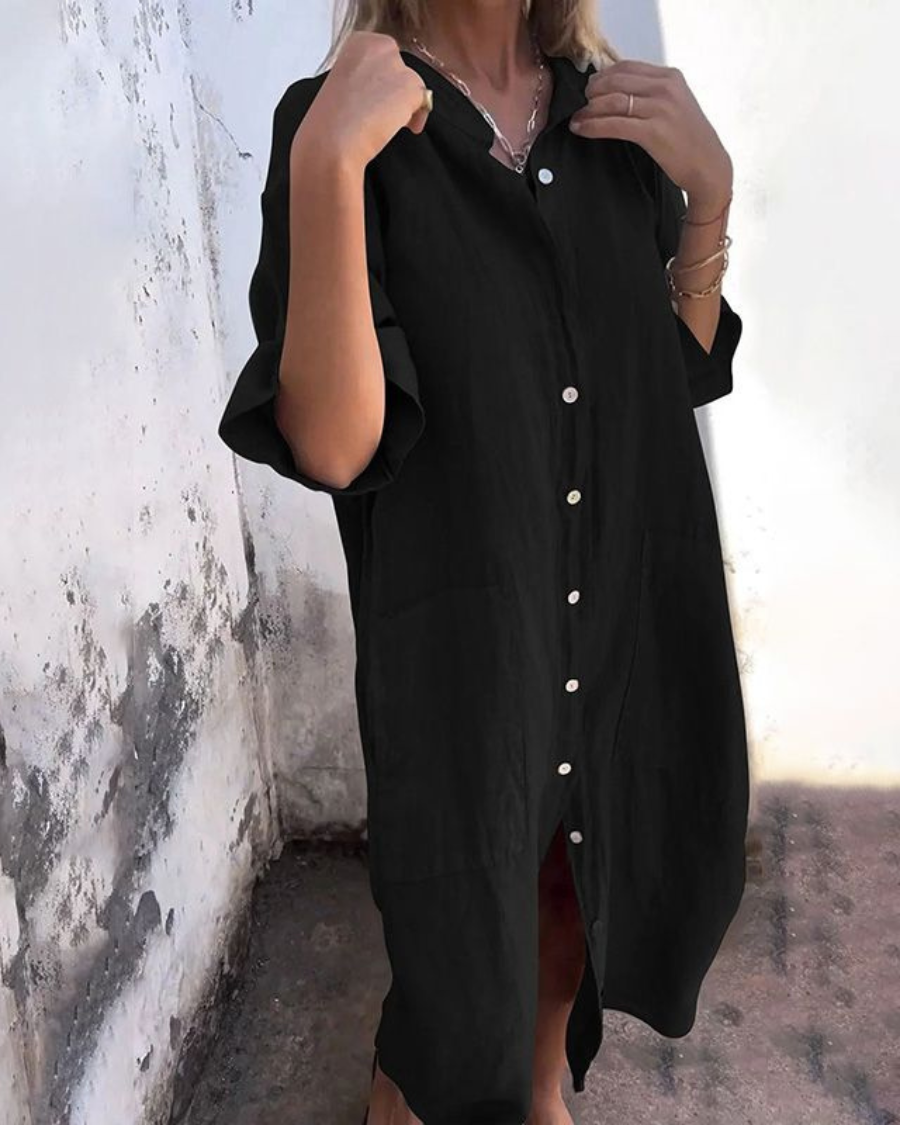 Flowy women's boho floral maxi dress, featuring a stylish button-down design, ideal for summer vacation.
