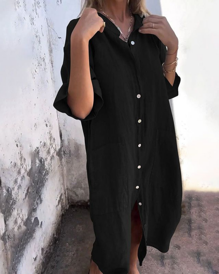 Flowy women's boho floral maxi dress, featuring a stylish button-down design, ideal for summer vacation.