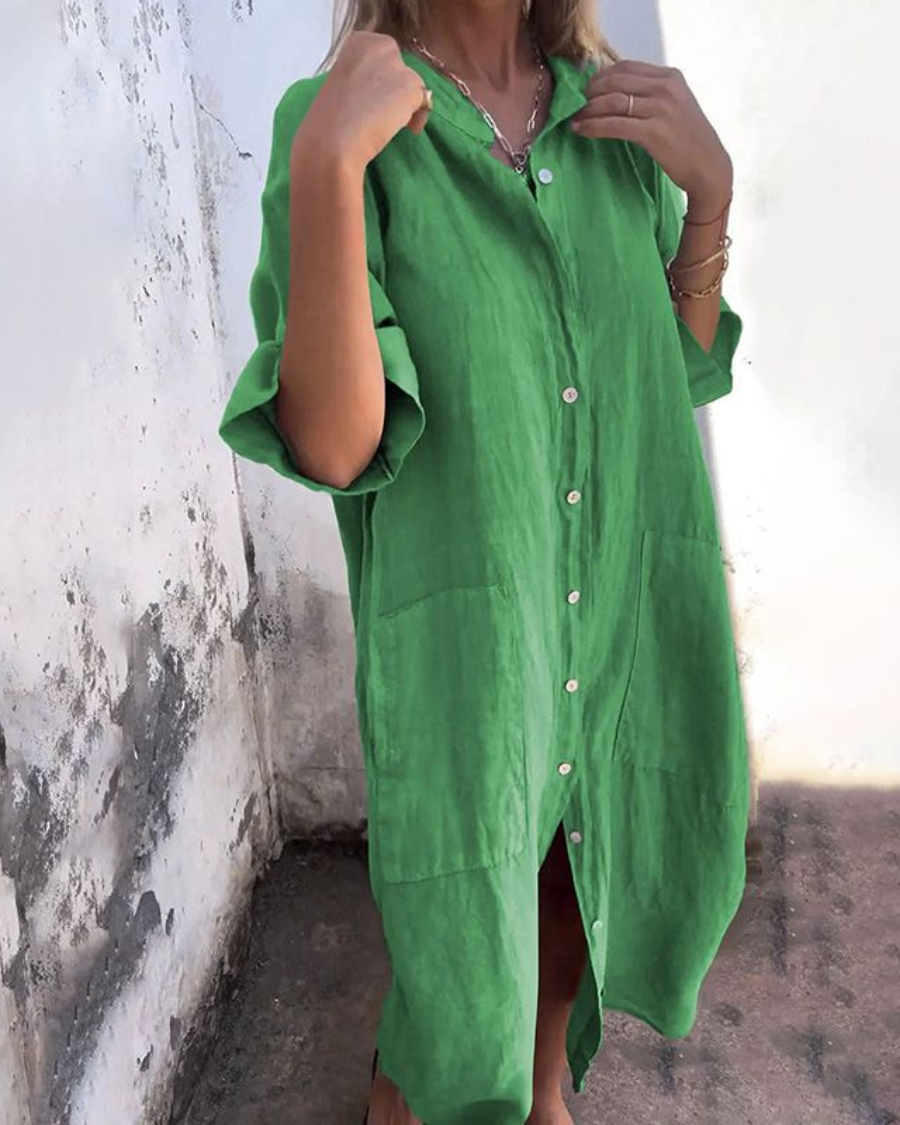 Casual women's long boho maxi dress with a beautiful floral pattern and practical button-down front.
