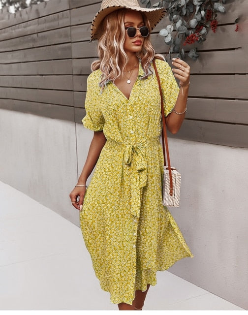 Elegant women's floral print midi dress, V-neck, button details. Ideal for boho summer fashion or spring events.