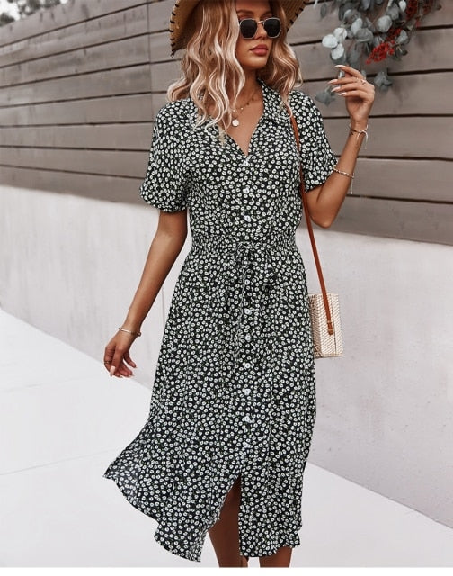 Casual women's boho midi dress with vibrant floral pattern, V-neckline, and functional front buttons.