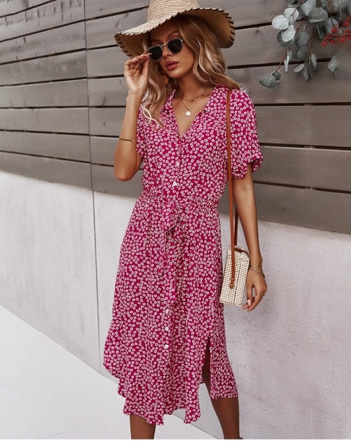 Chic women's spring/summer midi dress, V-neck, button-down, with a charming bohemian floral print design.