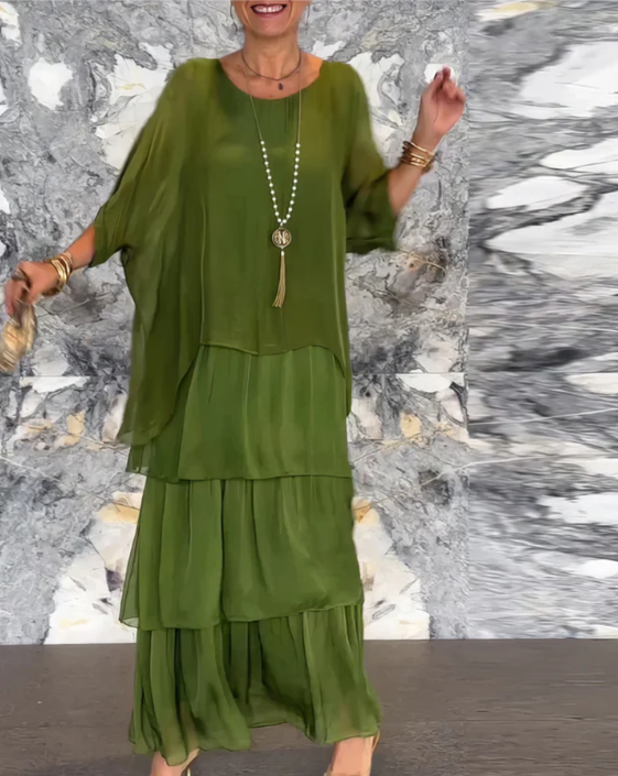 Women's casual elegant boho maxi dress set, with a comfortable batwing top and a flowy layered skirt.