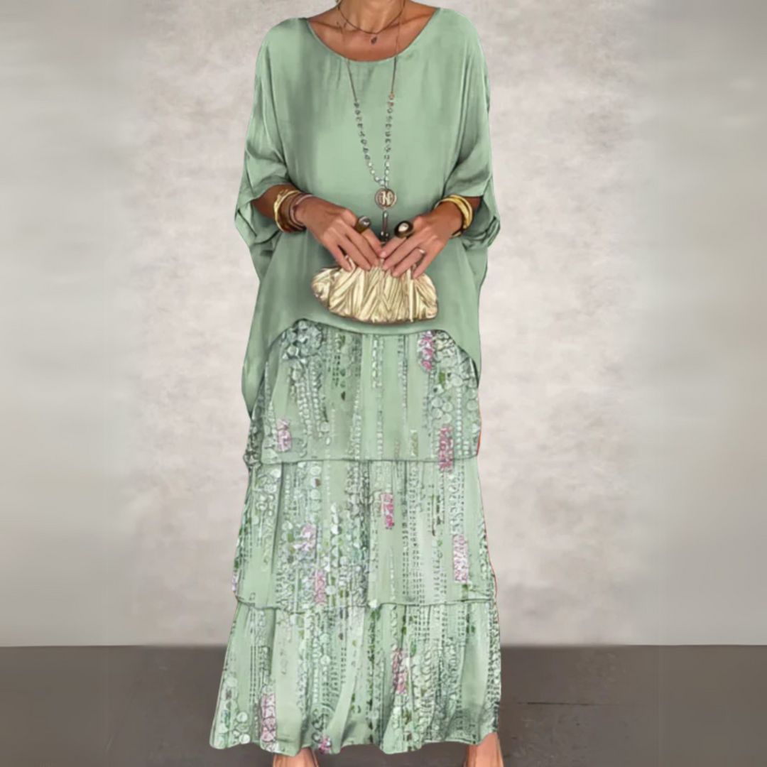 Elegant women's multicolor boho maxi set, a flowy tiered skirt and comfortable batwing sleeve top.