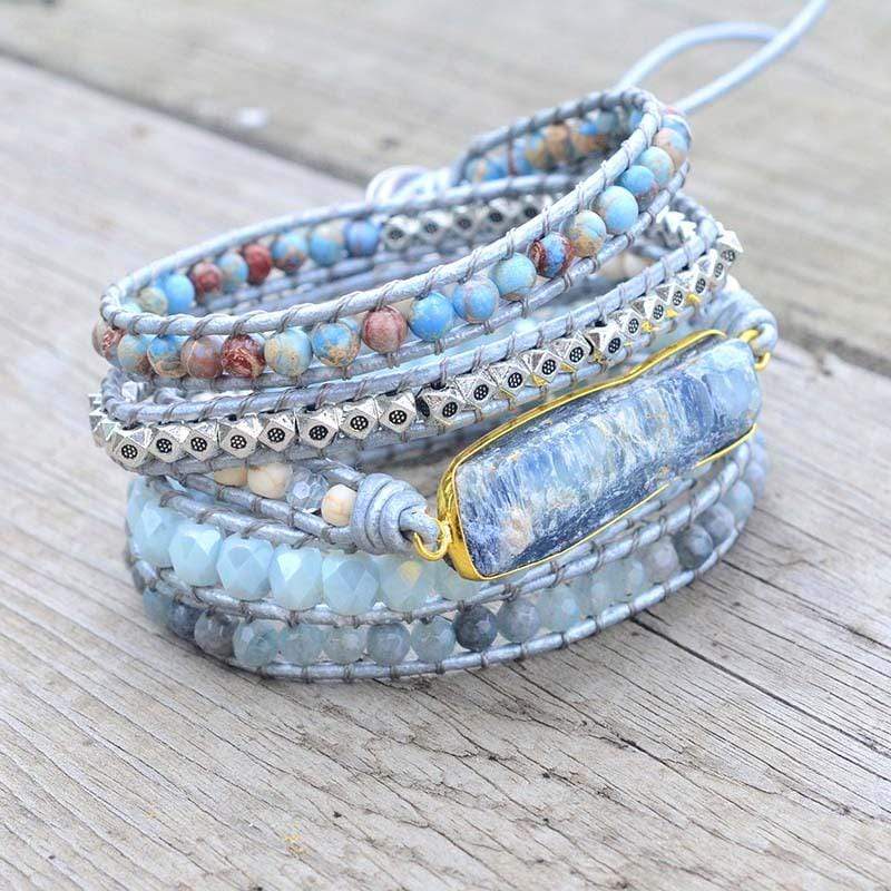 Full view of a women's multi-strand blue topaz and jasper wrap bracelet, healing accessory