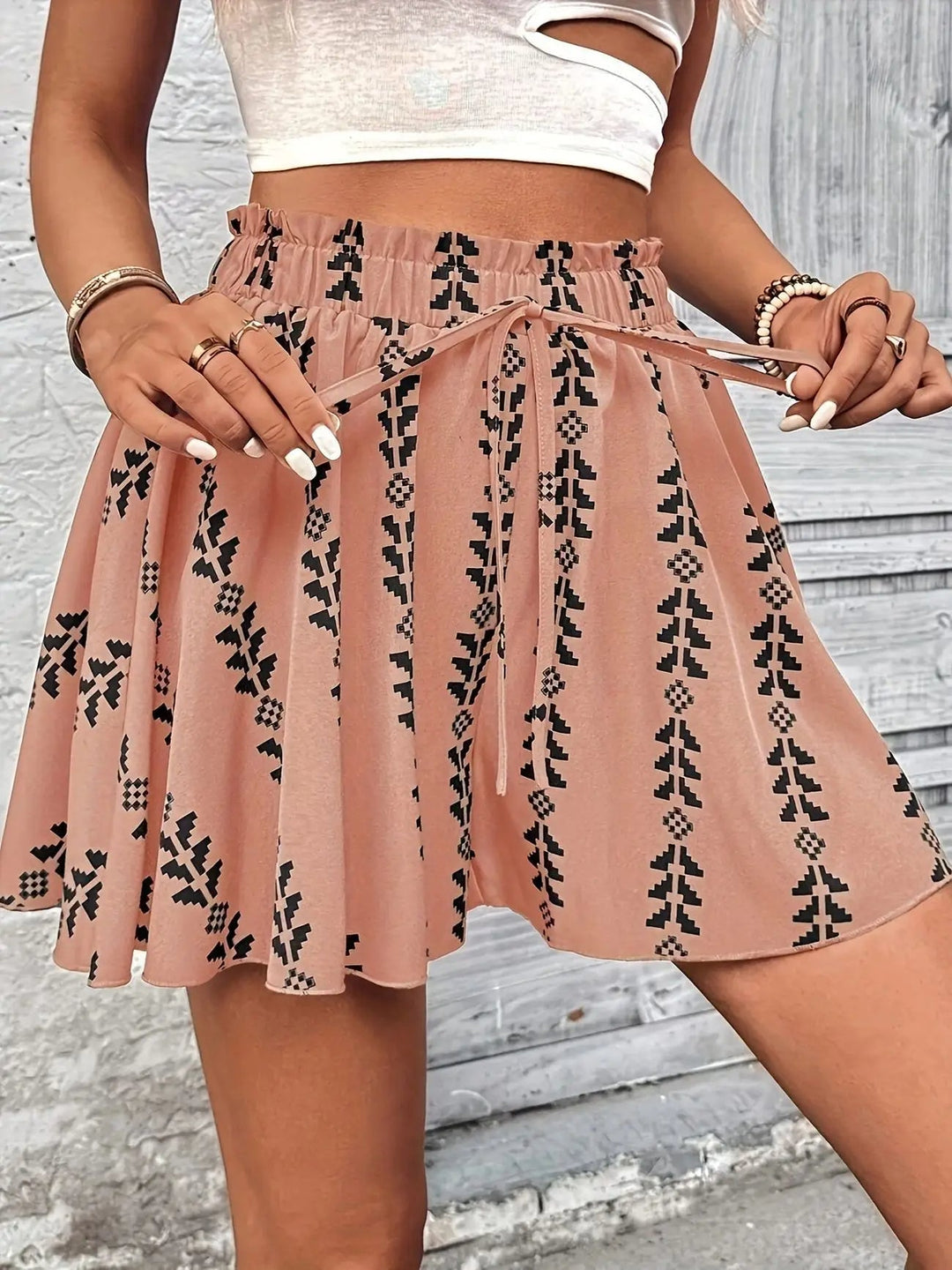 Women's casual flare shorts, high-rise, geometric print, smocked waist, vacation essential.
