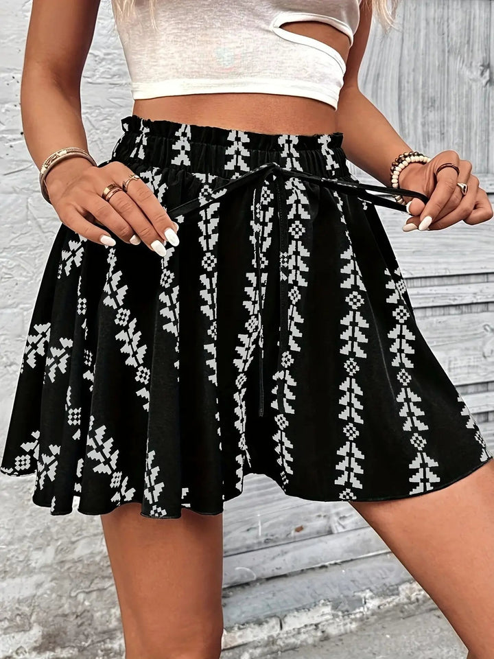 Casual women's flare shorts with smocked waist, high-rise, geometric pattern for summer.