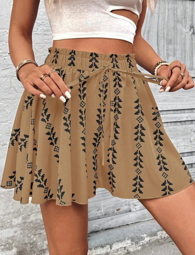 Bohemian high-rise flare shorts for women, casual summer fashion, geometric print, vacation wear.