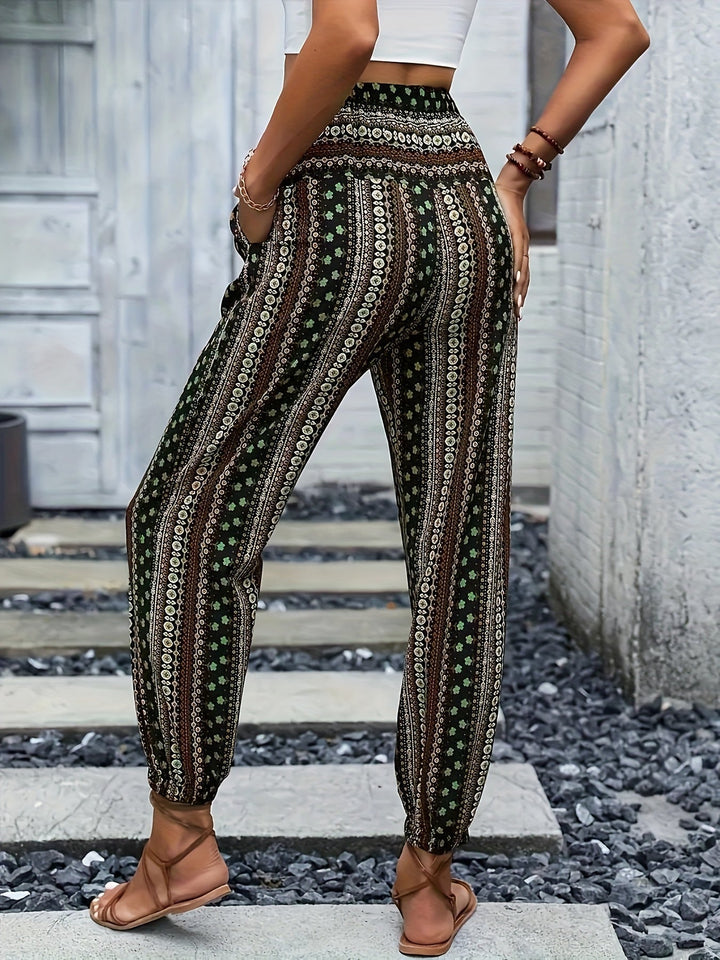 Fashionable women's boho trousers, high-waisted with an eye-catching print & comfortable smocked fit.