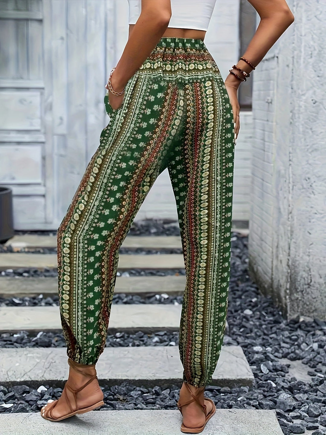 Vibrant printed high-waist boho pants, essential for women's vacation outfits & relaxed summer days.