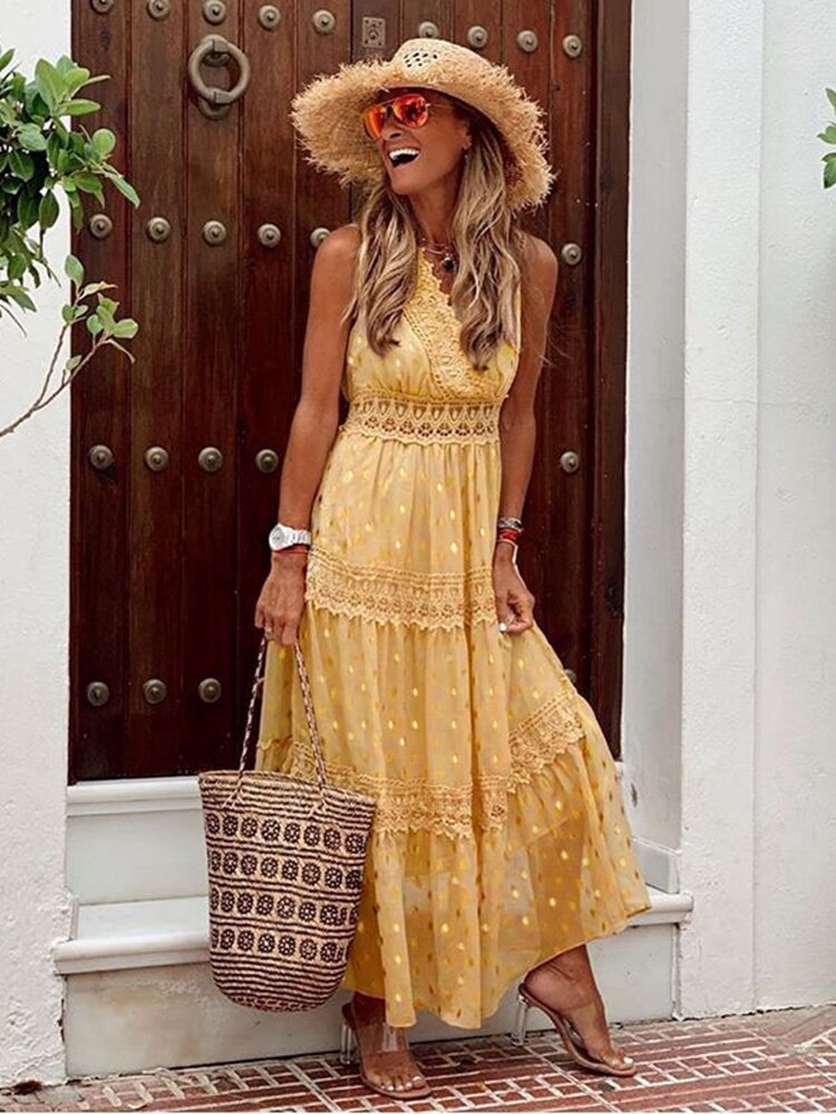 Stylish women's bohemian maxi dress, ideal for beach days, summer vacations, and casual long dress wear. Ibiza style.