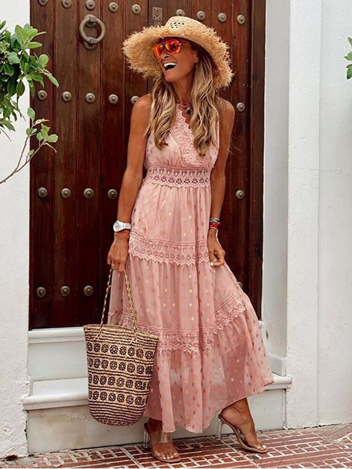 Relaxed women's bohemian maxi dress, a perfect summer dress for vacation or beach, with a chic Ibiza aesthetic.