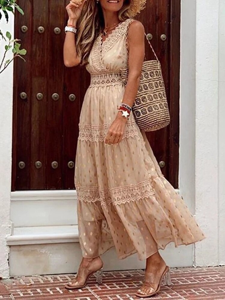 Elegant women's Boho Ibiza long dress, a versatile maxi for summer, beach, and vacation fashion. Flowy design.