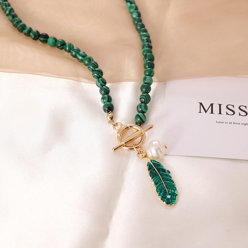 Elegant women's necklace with natural malachite gemstones & lustrous pearls. Boho spiritual healing jewelry.