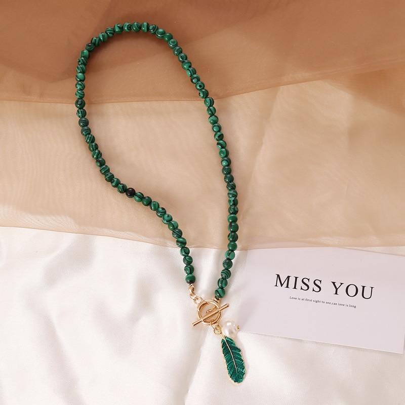 Malachite & pearl aura necklace for women. Bohemian spiritual healing gemstone jewelry, perfect for any occasion.