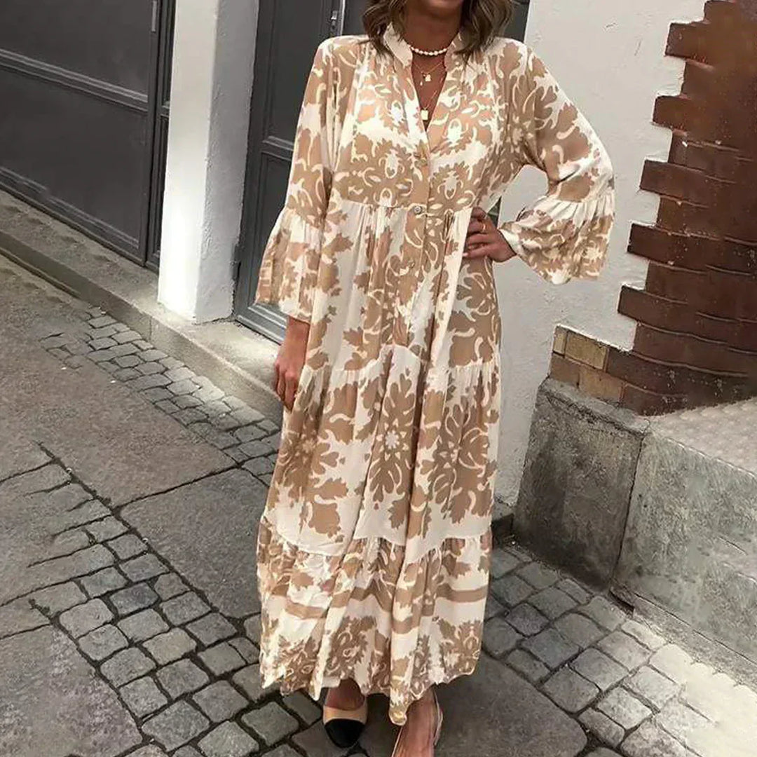 Women's boho maxi dress with elegant baroque print, lantern sleeves, and button-down front. Perfect for summer.