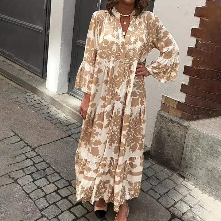 Women's boho maxi dress with elegant baroque print, lantern sleeves, and button-down front. Perfect for summer.