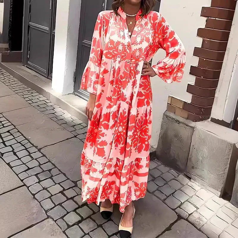 Stylish women's summer vacation maxi dress featuring a vibrant baroque print, lantern sleeves, and buttons.