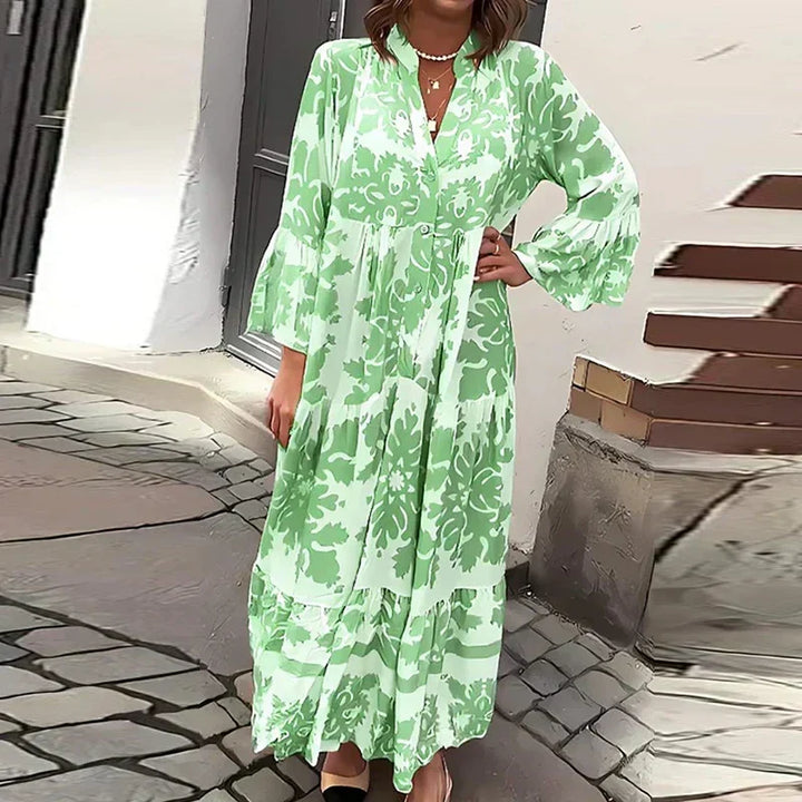 Women's long boho maxi dress with intricate baroque print, lantern sleeves & full button-down design.