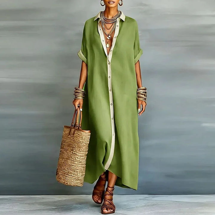 Boho-inspired women's maxi shirt dress with a vibrant contrast print and relaxed fit.