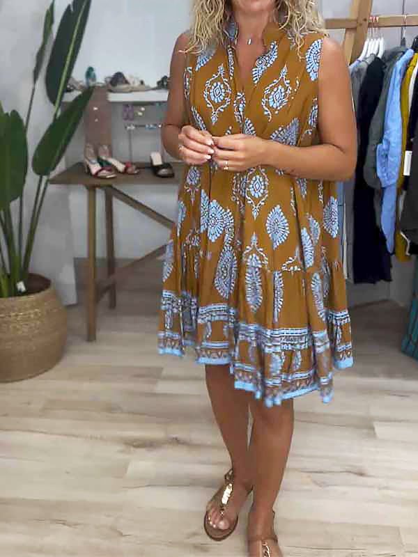 Casual women's smock mini dress in boho medallion print. Sleeveless and comfortable for summer vacation or daily wear.