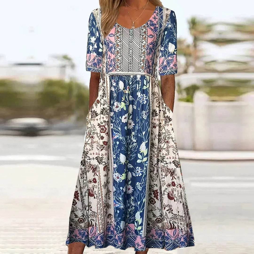 Stylish women's short sleeve boho print midi dress with a flattering gathered waist and convenient pockets.