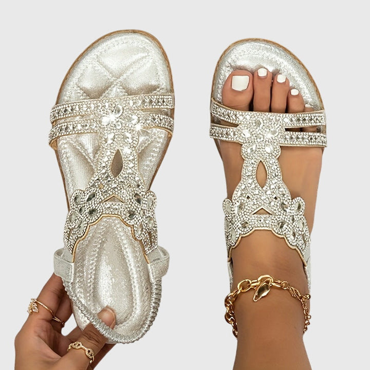 Slip-on comfort flat sandals for women, adorned with glamorous rhinestones.