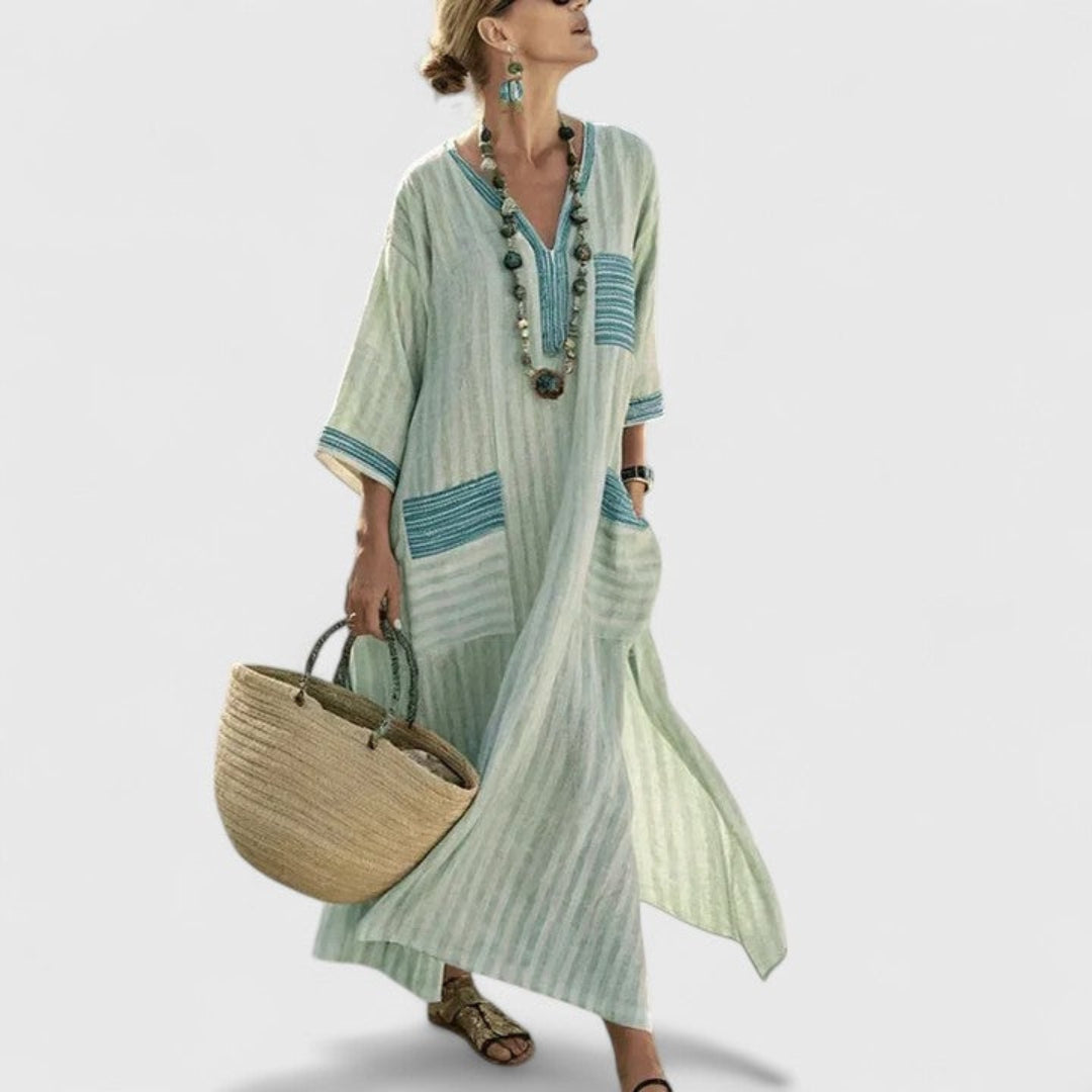 Women's boho striped maxi dress, V-neck, loose-fit kaftan style with practical side pockets for summer.