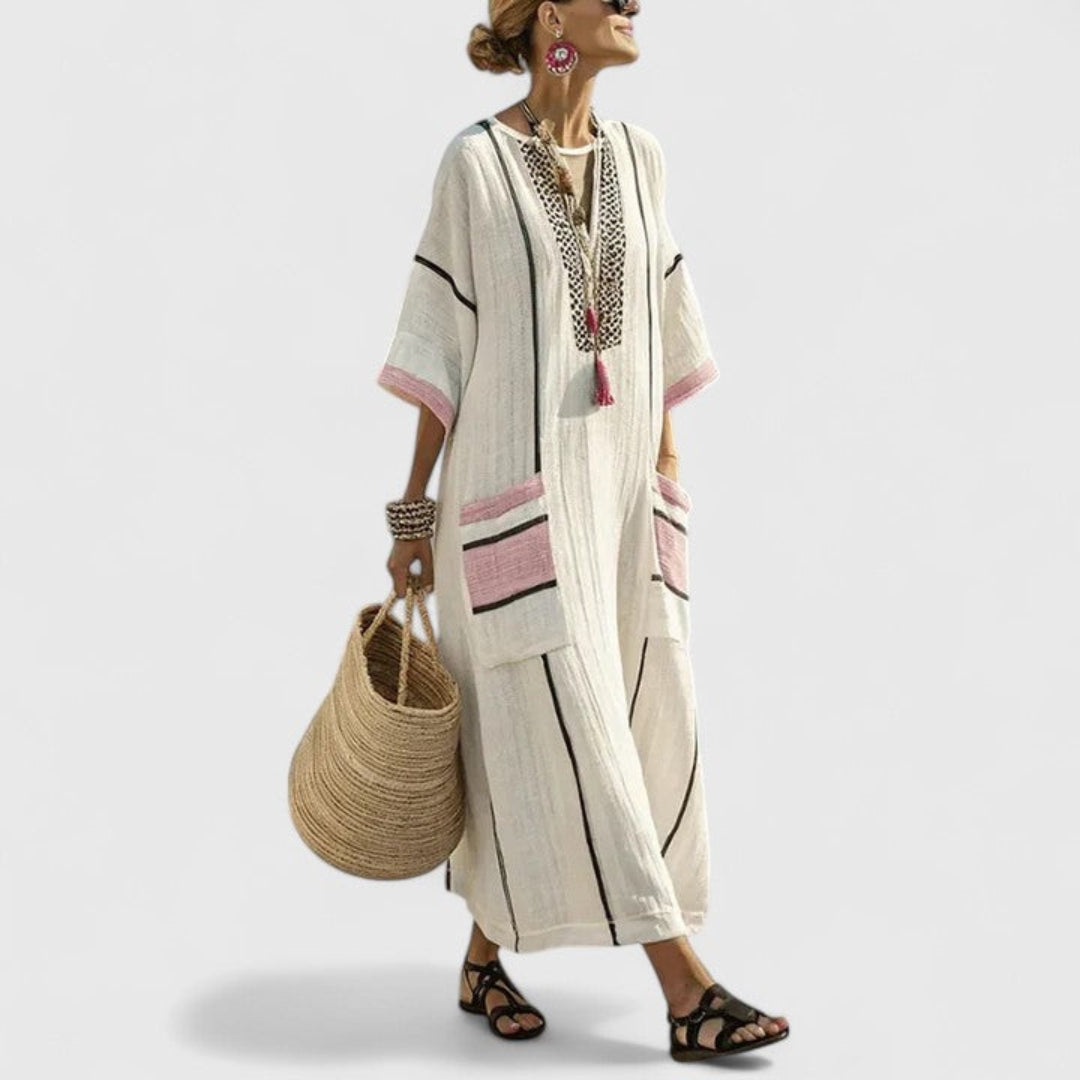 Women's striped boho maxi dress, a breezy V-neck kaftan with pockets, ideal for beach, resort, or vacation.