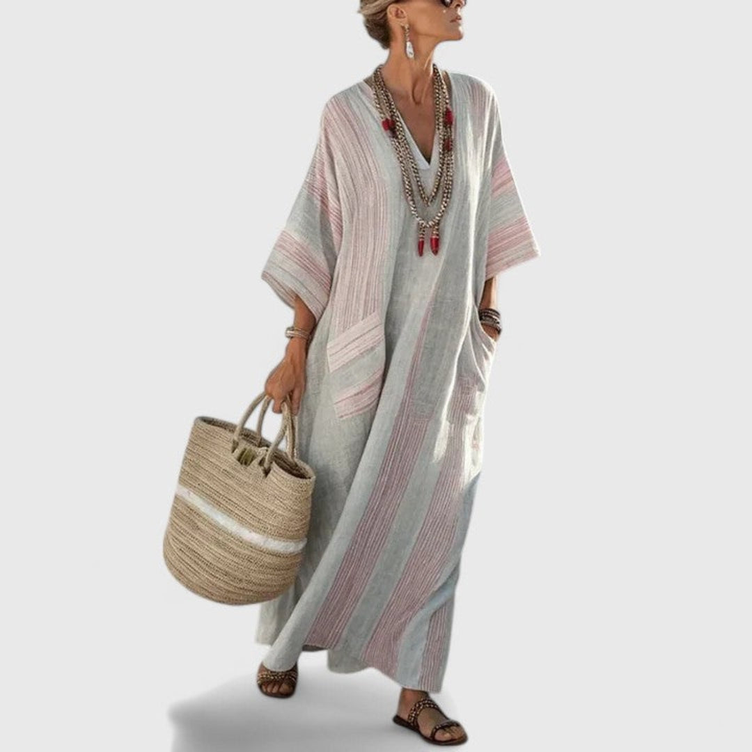 Versatile women's V-neck striped maxi dress. A loose boho kaftan with pockets, perfect for summer casual outings.
