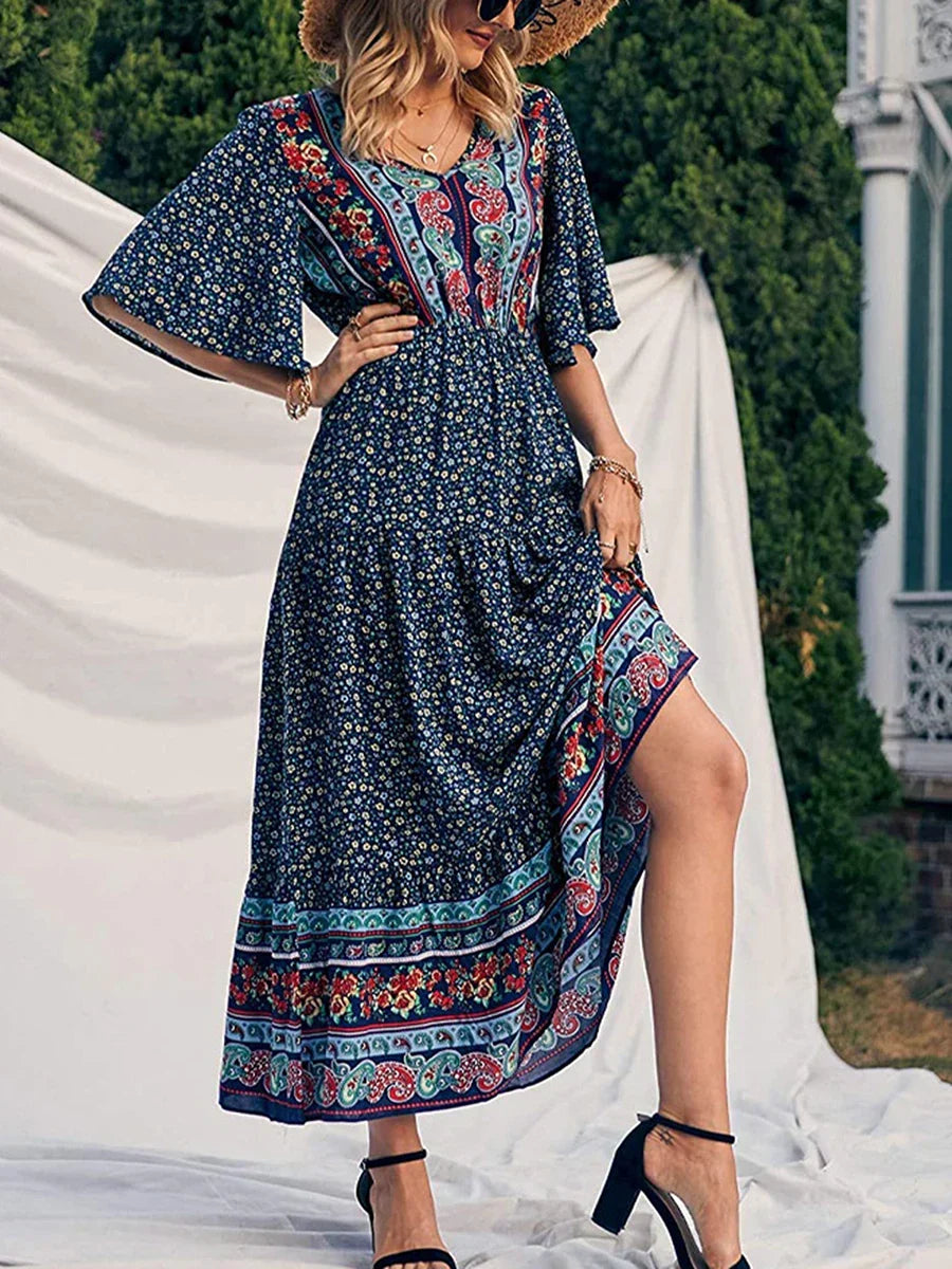 Women's Boho Summer Elegance Dress, flowing V-neck with vibrant print. Perfect casual vacation wear.