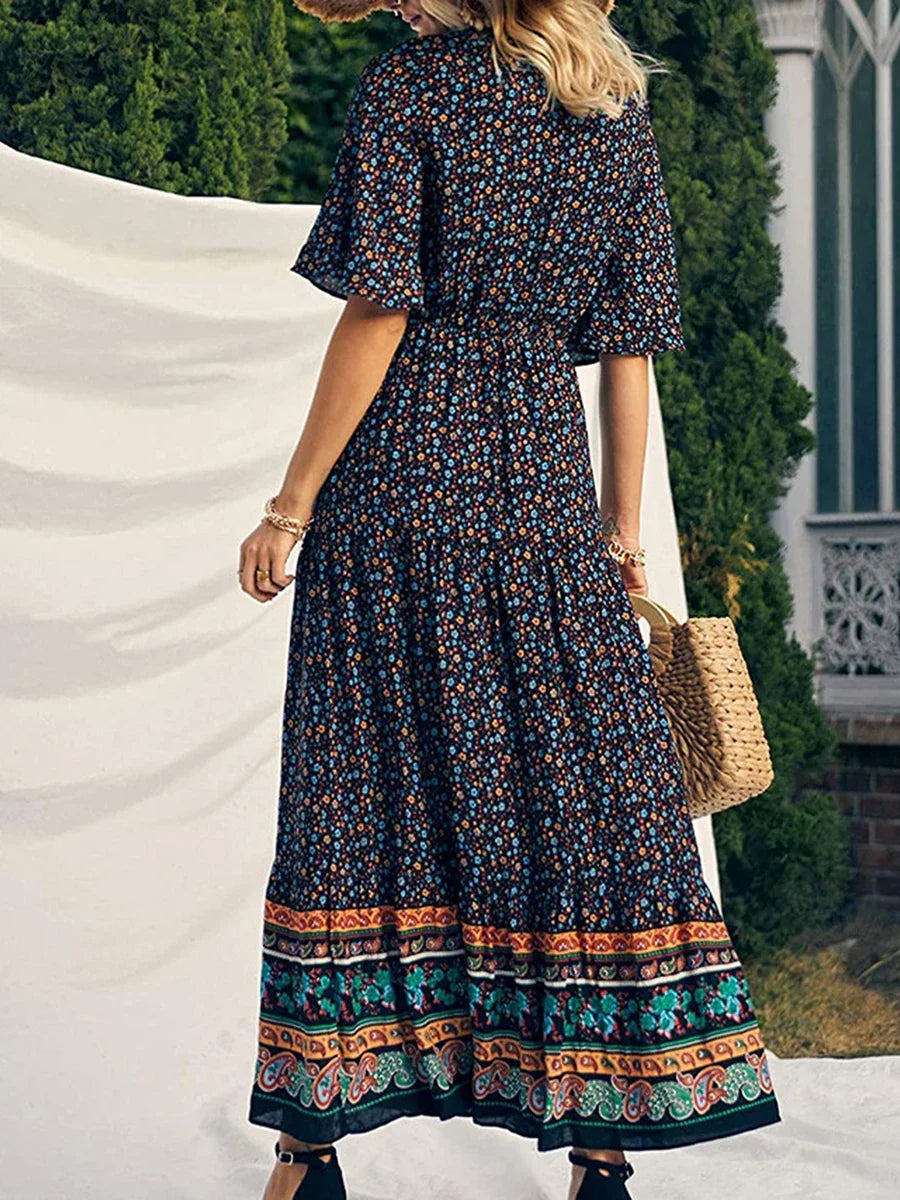 Radiant women's flowing boho summer dress, elegant short sleeve V-neck, ideal for casual outings.