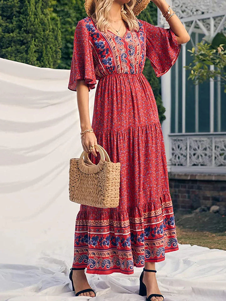 Casual women's boho summer dress, printed V-neck with short sleeves, radiant flowing elegance.