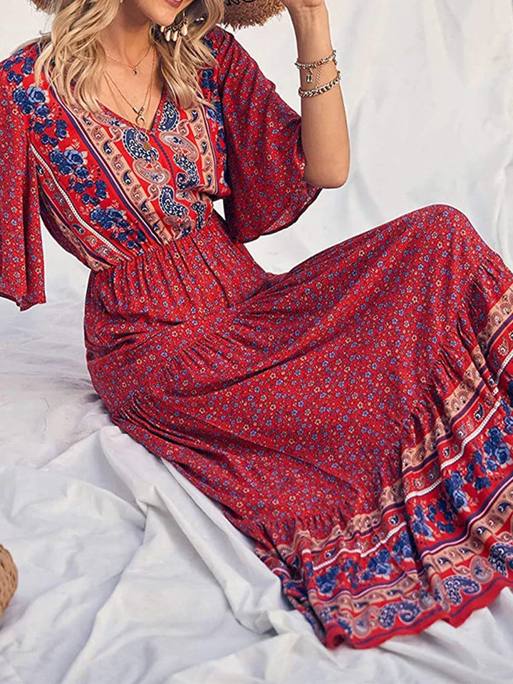 Boho summer V-neck dress for women, radiant floral print, short sleeve, flowing casual style.