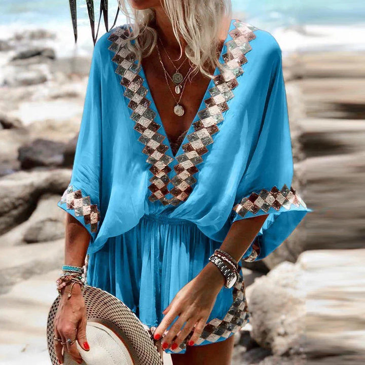 Women's boho V-neck short romper jumpsuit with elastic waist, perfect for summer casual wear, beach, or vacation.