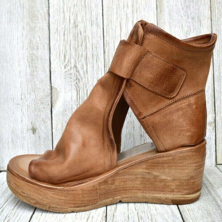 Profile view of women's comfortable orthopedic wedge sandals in boho style, perfect for summer walks.