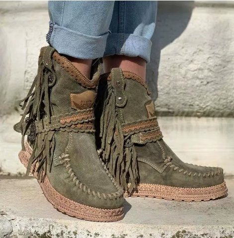 Platform western ankle boots for women, featuring chic fringe detail & boho style for festivals.