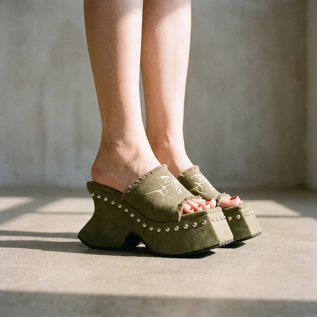 Women's bold chunky platform sandals in versatile khaki, perfect for elevated summer style and retro fashion.