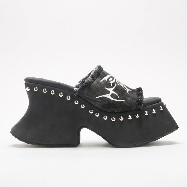 Bold women's chunky platform slip-on mules, available in gray, perfect for a chic and elevated summer outfit.