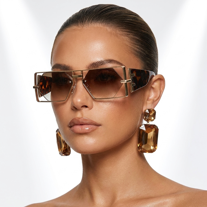 Fashionable women's edgy sunglasses, modern design, offering essential UV400 eye protection.